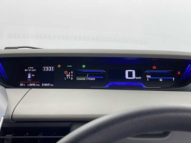 ホンダ フリード ハイブリット G 鹿児島県 2022(令4)年 1.9万km クリスタルブラックパール 純正９型ナビ　/（フルセグ/Ｂｌｕｅｔｏｏｔｈ/CD/DVD)　/アダプティブクルーズコントロール　/両側パワースライドドア　/バックカメラ　/オートライト　/ステアリングリモコン　/ビルドインＥＴＣ　/リアサンシェード　/シートヒーター/LEDヘッドライト/保証書/取扱説明書