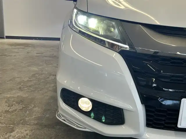 ホンダ オデッセイ アブソルート 20thアニバーサリー 静岡県 2015(平27)年 10.8万km ホワイトオーキッドパール (株)IDOMが運営する【じしゃロン浜松店】の自社ローン専用車両になりますこちらは現金またはオートローンご利用時の価格です。自社ローンご希望の方は別途その旨お申付け下さい/純正ナビ（VXM-155VFEi)/CD/DVD/AM/FM/Bluetooth/バックカメラ/両側パワースライドドア/LEDヘッドライト/LEDルームランプ/Honda　SENSING/●誤発進抑制機能/●先行車発進お知らせ機能/●標識認識機能/●LKAS〈車線維持支援システム〉/●路外逸脱抑制機能/●ACC〈アダプティブ・クルーズ・コントロール〉
