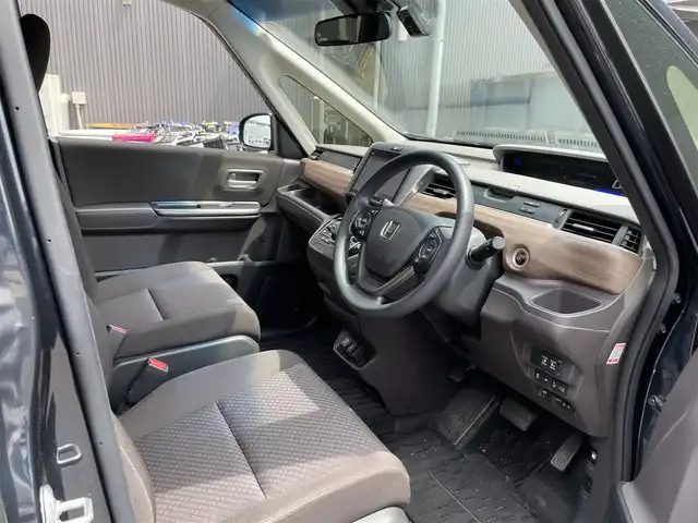 ホンダ フリード ハイブリット G ホンダセンシング 滋賀県 2020(令2)年 2.5万km ミッドナイトブルービームM 禁煙車/純正９型ナビ/【Ｂｌｕｅｔｏｏｔｈ/フルセグＴＶ/CD/DVD/HDMI】/ビルトインＥＴＣ/バックカメラ/ドライブレコーダー/両側パワースライドドア/ホンダセンシング/・衝突軽減ブレーキ/・歩行者事故低減ステアリング/・アダプティブクルーズコントロール/・車線維持支援システム/・路外逸脱抑制機能/・誤発進抑制機能/・先行車発進お知らせ機能/・標識認識機能/シートヒーター/ＬＥＤライト/スマートキー/ステアリングスイッチ/リアソナー/オートリトラミラー