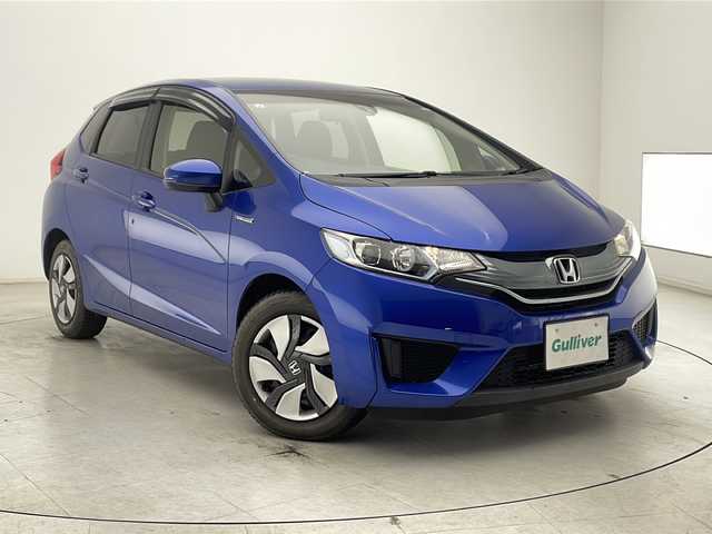 ホンダ フィット ハイブリット Fパッケージ 千葉県 2013(平25)年 2.4万km ブリリアントスポーティブルーメタリック2トーン 純正ナビ【VXM-145VFi】　DVD/Bluetooth/バックカメラ　/ＥＴＣ　　/スマートキー/プッシュスタート/アイドリングストップ/オートライト/純正フロアマット/純正ドアバイザー