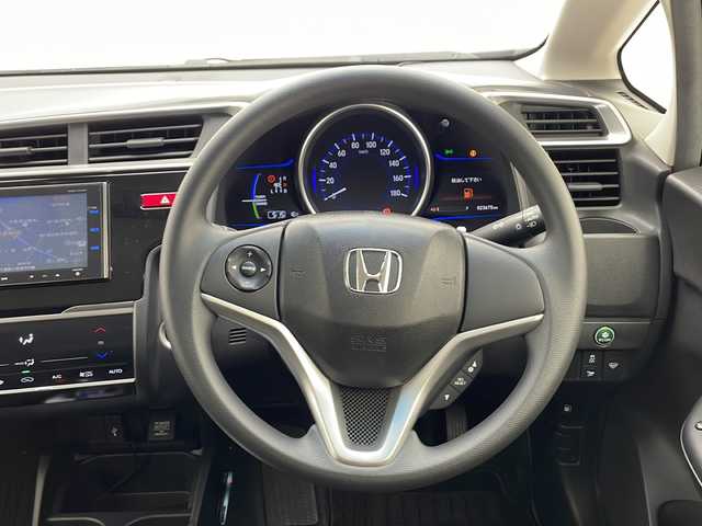 ホンダ フィット ハイブリット Fパッケージ 千葉県 2013(平25)年 2.4万km ブリリアントスポーティブルーメタリック2トーン 純正ナビ【VXM-145VFi】　DVD/Bluetooth/バックカメラ　/ＥＴＣ　　/スマートキー/プッシュスタート/アイドリングストップ/オートライト/純正フロアマット/純正ドアバイザー