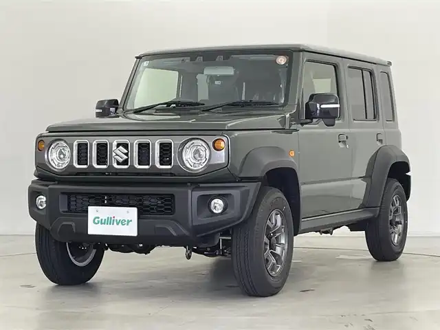 スズキ ジムニー ノマド FC 群馬県 2025(令7)年 0.1万km未満 Ｄグリーン ・登録済未使用車(登録時走行距離：46km)/純正9インチナビ/・AM/FM/CD/DVD/SD/Bluetooth/フルセグTV/バックカメラ/デュアルカメラブレーキサポート/車線逸脱警報/ふらつき警報/後退時ブレーキサポート/アダプティブクルーズコントロール/ハイビームアシスト/標識認識機能/誤発進/後方誤発進抑制機能/先行車発進お知らせ機能/ヒルディセントコントロール/LEDヘッドランプ/ヘッドランプウォッシャー/前席パワーシート/純正15インチアルミホイール