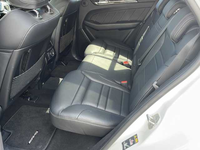 メルセデス・ベンツ ＭＬ６３ 東京都 2012(平24)年 4.2万km ダイヤモンドホワイト 純正ナビ：プレミアムサウンド Harman Kardon/Bluetooth/バックカメラ＆サイドカメラ/ETC/衝突軽減ブレーキ/クルーズコントロール/D/N席メモリーシート/D/N席パワーシート/D/N席シートヒーター/D/N席エアシート/パドルシフト/パノラマミックススライディングルーフ/エアサス/パワーバックドア/LEDオートライト/プッシュスタート/スマートキー×2