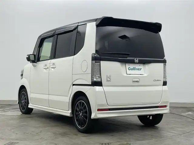 ホンダ Ｎ ＢＯＸ カスタム G ターボ Lパッケージ 岡山県 2016(平28)年 6.5万km プレミアムホワイトパールⅡ 純正SDナビゲーションシステム/・型番：AVIC-ZH0999L/【Bluetooth/フルセグTV/CD/DVD】/両側パワースライドドア/クルーズコントロール/ハーフレザーシート/LEDヘッドライト＆LEDフォグランプ/ビルトインETC/バックカメラ/衝突軽減ブレーキシステム/パドルシフト/アイドリングストップ/ISOFIX/ステアリングスイッチ/チルトステアリング/シートリフター/ウインカーミラー/ドアバイザー/新車保証書/取扱説明書/スペアキー×１