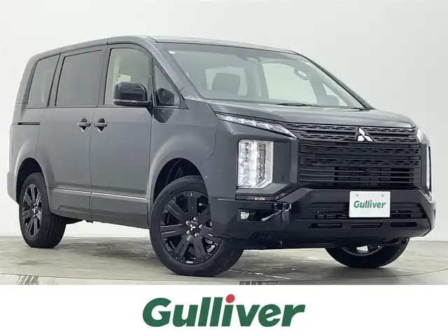 三菱 デリカＤ：５ ブラックエディション 宮城県 2025(令7)年 0.1千km グレーⅡ ブラックエディション　4WD　e-Assist/オリジナルナビ取付パッケージ＋リアモニター取付パッケージ(25/300)　ステップレス　（7人）D:5専用11型ナビゲーション(322/300)/登録済未使用車/専用アルパイン１１型ナビ/全周囲カメラ/革シート/パワーバックドア/パワーシート/アダプティブクルーズ/シートヒーター/ＢＳＭ/オートハイビーム/衝突軽減/レーンキープ/専用１８ＡＷ