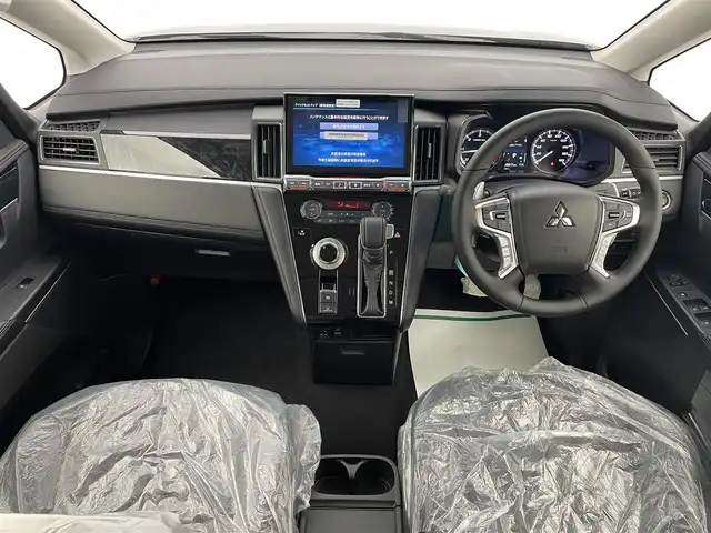 三菱 デリカＤ：５ ブラックエディション 宮城県 2025(令7)年 0.1千km グレーⅡ ブラックエディション　4WD　e-Assist/オリジナルナビ取付パッケージ＋リアモニター取付パッケージ(25/300)　ステップレス　（7人）D:5専用11型ナビゲーション(322/300)/登録済未使用車/専用アルパイン１１型ナビ/全周囲カメラ/革シート/パワーバックドア/パワーシート/アダプティブクルーズ/シートヒーター/ＢＳＭ/オートハイビーム/衝突軽減/レーンキープ/専用１８ＡＷ
