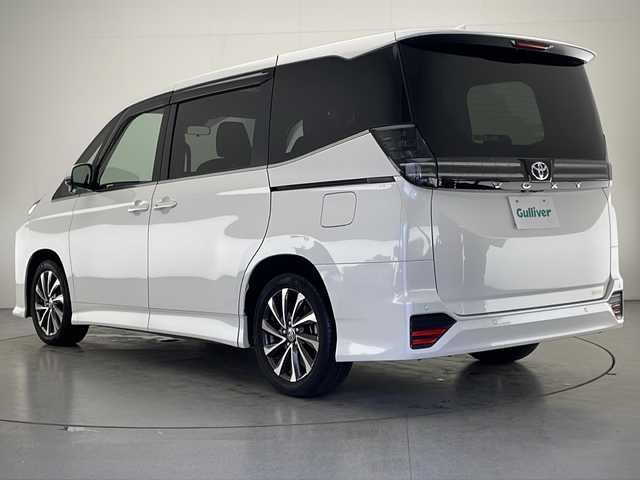 トヨタ ヴォクシー S－Z 宮崎県 2022(令4)年 1.1万km ホワイトパールクリスタルシャイン 禁煙車/トヨタセーフティセンス/純正10.5型ディスプレイオーディオナビTV/（T-CONNECT/Bluetooth/CD/DVD/フルセグTV)/純正14型有機ELリアフリップダウンモニター/（V14T-R72R）/純正バックカメラ/純正ビルトイン2.0ETC/純正LEDオートライト/純正フロアマット/両側電動スライドドア/プリクラッシュセーフティ/オートマチックハイビーム/レーンディパーチャーアラート/アダプティブクルーズコントロール/クリアランスソナー/電子パーキング/オートホールド/ハーフレザーシート/前席シートヒーター/オート電動格納ミラー/本革巻ハンドル/スマートキー/プッシュエンジンスタート/スペアキー/新車時保証書/取扱い説明書