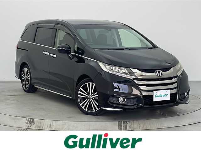 ホンダ オデッセイ アブソルート・EXホンダセンジング 宮城県 2016(平28)年 5.3万km クリスタルブラックパール 純正インターナビ　/フリップダウンモニター　/全周囲カメラ　/両側パワースライドドア　/アダプティブクルーズコントロール/衝突軽減ブレーキ　/レーンキープアシスト　/誤発進抑制機能　/ＬＥＤヘッドライト　/ブラインドスポットインフォメーション　/大型アームレスト　/運転席8wayパワーシート　/ハーフレザーシート/後席オットマン/ビルトインETC/純正18インチAW/禁煙車
