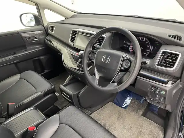 ホンダ オデッセイ アブソルート・EXホンダセンジング 宮城県 2016(平28)年 5.3万km クリスタルブラックパール 純正インターナビ　/フリップダウンモニター　/全周囲カメラ　/両側パワースライドドア　/アダプティブクルーズコントロール/衝突軽減ブレーキ　/レーンキープアシスト　/誤発進抑制機能　/ＬＥＤヘッドライト　/ブラインドスポットインフォメーション　/大型アームレスト　/運転席8wayパワーシート　/ハーフレザーシート/後席オットマン/ビルトインETC/純正18インチAW/禁煙車