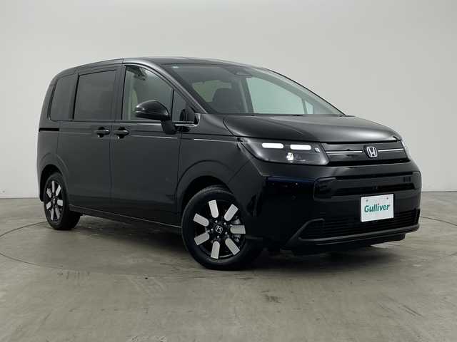 ホンダ フリード ハイブリット e:HEV AIR EX 兵庫県 2025(令7)年 0.1千km クリスタルブラックパール ・未使用車/・純正9インチナビ/・BT・TV・Apple Car Play・AndroidAuto/・両側パワースライドドア/・CMBS/・ACC/・レーンキープアシスト/・ブラインドスポットインフォメーション/・標識認識機能/・シートヒーター/・ハーフレザー/・オートマチックハイビーム/・LEDヘッドライト/・革巻きステアリング/・ステアリングリモコン/・プッシュスタート/・スペアキー/・電動パーキングブレーキ/・オートブレーキホールド/・純正15インチアルミホール