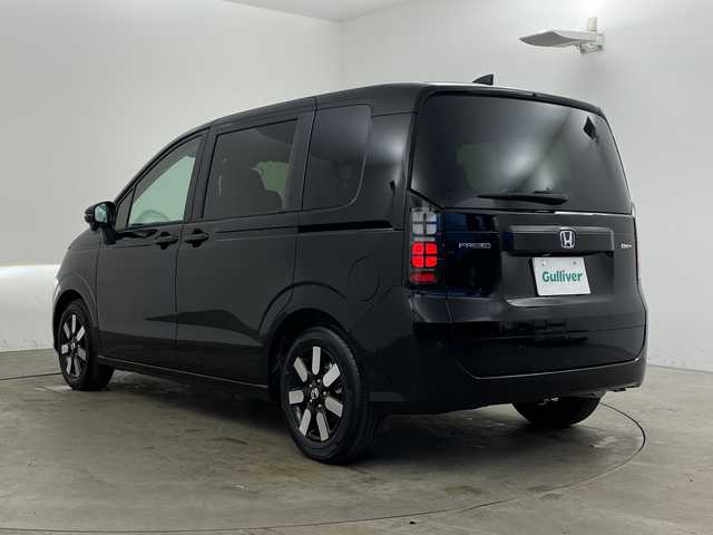 ホンダ フリード ハイブリット e:HEV AIR EX 兵庫県 2025(令7)年 0.1千km クリスタルブラックパール ・未使用車/・純正9インチナビ/・BT・TV・Apple Car Play・AndroidAuto/・両側パワースライドドア/・CMBS/・ACC/・レーンキープアシスト/・ブラインドスポットインフォメーション/・標識認識機能/・シートヒーター/・ハーフレザー/・オートマチックハイビーム/・LEDヘッドライト/・革巻きステアリング/・ステアリングリモコン/・プッシュスタート/・スペアキー/・電動パーキングブレーキ/・オートブレーキホールド/・純正15インチアルミホール