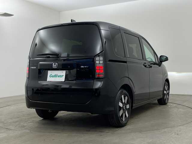 ホンダ フリード ハイブリット e:HEV AIR EX 兵庫県 2025(令7)年 0.1千km クリスタルブラックパール ・未使用車/・純正9インチナビ/・BT・TV・Apple Car Play・AndroidAuto/・両側パワースライドドア/・CMBS/・ACC/・レーンキープアシスト/・ブラインドスポットインフォメーション/・標識認識機能/・シートヒーター/・ハーフレザー/・オートマチックハイビーム/・LEDヘッドライト/・革巻きステアリング/・ステアリングリモコン/・プッシュスタート/・スペアキー/・電動パーキングブレーキ/・オートブレーキホールド/・純正15インチアルミホール