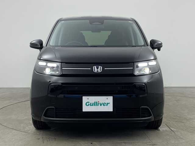 ホンダ フリード ハイブリット e:HEV AIR EX 兵庫県 2025(令7)年 0.1千km クリスタルブラックパール ・未使用車/・純正9インチナビ/・BT・TV・Apple Car Play・AndroidAuto/・両側パワースライドドア/・CMBS/・ACC/・レーンキープアシスト/・ブラインドスポットインフォメーション/・標識認識機能/・シートヒーター/・ハーフレザー/・オートマチックハイビーム/・LEDヘッドライト/・革巻きステアリング/・ステアリングリモコン/・プッシュスタート/・スペアキー/・電動パーキングブレーキ/・オートブレーキホールド/・純正15インチアルミホール