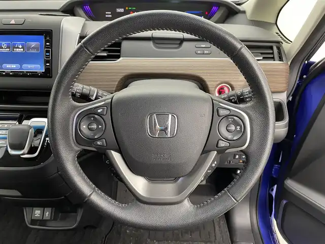 ホンダ フリード ハイブリット クロスター 宮城県 2023(令5)年 2.9万km プレミアムクリスタルブルークリスタル 純正ナビ/両側パワースライドドア/アダプティブクルーズコントロール/シートヒーター/ハーフレザーシート/ＬＥＤヘッドライト/ルーフレール/バックモニター/ETC/衝突軽減ブレーキ/レーンキープアシスト/フルセグTV/Bluetoothオーディオ/CD/DVD/フロントウィンドウ熱線/禁煙車