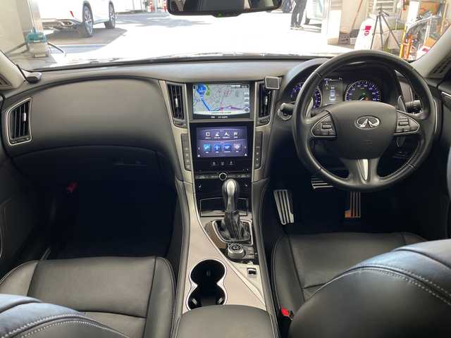 日産 スカイライン ハイブリッド 350GT Type SP 兵庫県 2014(平26)年 6.8万km ガーネットブラック ・純正ナビ&BT&CD&DVD&USB&TV/・全方位カメラ/・サンルーフ/・革シート/・ビルトインＥＴＣ/・エマージェンシーブレーキ/・車線逸脱防止支援システム/・車線逸脱警報/・後側方衝突防止支援/・後側方車両検知/・後退時衝突防止支援/・前方衝突予測警報/・ブレーキアシスト/・車両接近通報装置/・ステアリングスイッチ/・革巻きステアリング/・パドルシフト/・前席パワーシート/・シートヒーター/・フロアマット/・ＢＯＳＥサウンドシステム/・レーダークルーズコントロール/・クリアナンスソナー/・アンビエントＬＥＤライトシステム/・ＷＡＬＤ20インチアルミホイール/・ＨＫＳハイパフォーマンス車高調/・ヒルスタートアシスト/・スマートキー/・LEDライト/・保証書/・取扱説明書