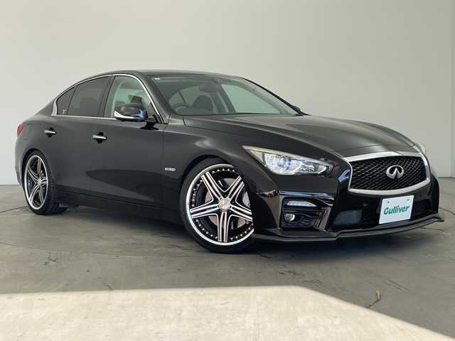 日産 スカイライン ハイブリッド 350GT Type SP 兵庫県 2014(平26)年 6.8万km ガーネットブラック ・純正ナビ&BT&CD&DVD&USB&TV/・全方位カメラ/・サンルーフ/・革シート/・ビルトインＥＴＣ/・エマージェンシーブレーキ/・車線逸脱防止支援システム/・車線逸脱警報/・後側方衝突防止支援/・後側方車両検知/・後退時衝突防止支援/・前方衝突予測警報/・ブレーキアシスト/・車両接近通報装置/・ステアリングスイッチ/・革巻きステアリング/・パドルシフト/・前席パワーシート/・シートヒーター/・フロアマット/・ＢＯＳＥサウンドシステム/・レーダークルーズコントロール/・クリアナンスソナー/・アンビエントＬＥＤライトシステム/・ＷＡＬＤ20インチアルミホイール/・ＨＫＳハイパフォーマンス車高調/・ヒルスタートアシスト/・スマートキー/・LEDライト/・保証書/・取扱説明書