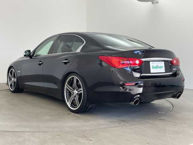 日産 スカイライン ハイブリッド 350GT Type SP 兵庫県 2014(平26)年 6.8万km ガーネットブラック ・純正ナビ&BT&CD&DVD&USB&TV/・全方位カメラ/・サンルーフ/・革シート/・ビルトインＥＴＣ/・エマージェンシーブレーキ/・車線逸脱防止支援システム/・車線逸脱警報/・後側方衝突防止支援/・後側方車両検知/・後退時衝突防止支援/・前方衝突予測警報/・ブレーキアシスト/・車両接近通報装置/・ステアリングスイッチ/・革巻きステアリング/・パドルシフト/・前席パワーシート/・シートヒーター/・フロアマット/・ＢＯＳＥサウンドシステム/・レーダークルーズコントロール/・クリアナンスソナー/・アンビエントＬＥＤライトシステム/・ＷＡＬＤ20インチアルミホイール/・ＨＫＳハイパフォーマンス車高調/・ヒルスタートアシスト/・スマートキー/・LEDライト/・保証書/・取扱説明書