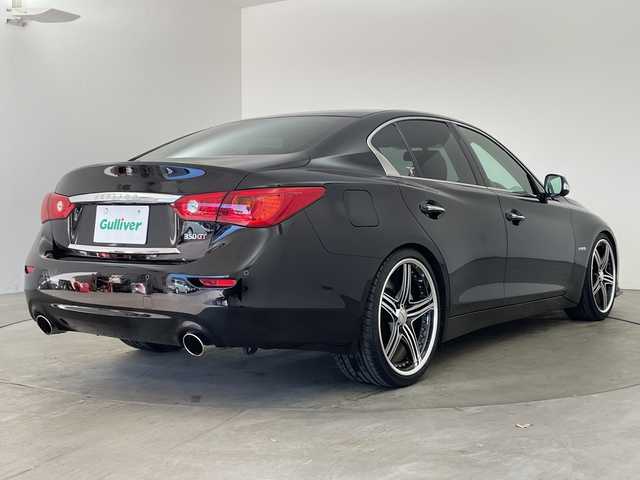 日産 スカイライン ハイブリッド 350GT Type SP 兵庫県 2014(平26)年 6.8万km ガーネットブラック ・純正ナビ&BT&CD&DVD&USB&TV/・全方位カメラ/・サンルーフ/・革シート/・ビルトインＥＴＣ/・エマージェンシーブレーキ/・車線逸脱防止支援システム/・車線逸脱警報/・後側方衝突防止支援/・後側方車両検知/・後退時衝突防止支援/・前方衝突予測警報/・ブレーキアシスト/・車両接近通報装置/・ステアリングスイッチ/・革巻きステアリング/・パドルシフト/・前席パワーシート/・シートヒーター/・フロアマット/・ＢＯＳＥサウンドシステム/・レーダークルーズコントロール/・クリアナンスソナー/・アンビエントＬＥＤライトシステム/・ＷＡＬＤ20インチアルミホイール/・ＨＫＳハイパフォーマンス車高調/・ヒルスタートアシスト/・スマートキー/・LEDライト/・保証書/・取扱説明書