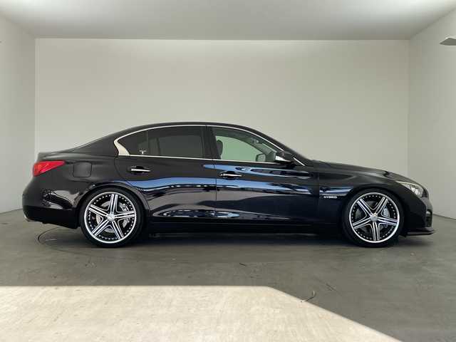 日産 スカイライン ハイブリッド 350GT Type SP 兵庫県 2014(平26)年 6.8万km ガーネットブラック ・純正ナビ&BT&CD&DVD&USB&TV/・全方位カメラ/・サンルーフ/・革シート/・ビルトインＥＴＣ/・エマージェンシーブレーキ/・車線逸脱防止支援システム/・車線逸脱警報/・後側方衝突防止支援/・後側方車両検知/・後退時衝突防止支援/・前方衝突予測警報/・ブレーキアシスト/・車両接近通報装置/・ステアリングスイッチ/・革巻きステアリング/・パドルシフト/・前席パワーシート/・シートヒーター/・フロアマット/・ＢＯＳＥサウンドシステム/・レーダークルーズコントロール/・クリアナンスソナー/・アンビエントＬＥＤライトシステム/・ＷＡＬＤ20インチアルミホイール/・ＨＫＳハイパフォーマンス車高調/・ヒルスタートアシスト/・スマートキー/・LEDライト/・保証書/・取扱説明書