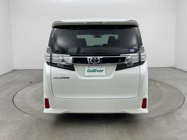 トヨタ ヴェルファイア Z 兵庫県 2015(平27)年 5万km ホワイトパールクリスタルシャイン ・社外10インチナビ（CN-F1X10BGD）/CD/DVD/Blu-ray/TV/SD/USB/HDMI/・バックカメラ/・純正11インチフリップダウンモニター（V11T-R62C）/・ビルトインETC/・両側パワースライドドア/・社外デジタルインナーミラー型前後ドライブレコーダー/・AC１００V電源/・社外車高調/・社外20インチアルミホイール/・nanoe/・LEDヘッドライト/・オートライト/・フォグランプ/・スマートキー/・プッシュスタート