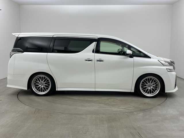 トヨタ ヴェルファイア Z 兵庫県 2015(平27)年 5万km ホワイトパールクリスタルシャイン ・社外10インチナビ（CN-F1X10BGD）/CD/DVD/Blu-ray/TV/SD/USB/HDMI/・バックカメラ/・純正11インチフリップダウンモニター（V11T-R62C）/・ビルトインETC/・両側パワースライドドア/・社外デジタルインナーミラー型前後ドライブレコーダー/・AC１００V電源/・社外車高調/・社外20インチアルミホイール/・nanoe/・LEDヘッドライト/・オートライト/・フォグランプ/・スマートキー/・プッシュスタート