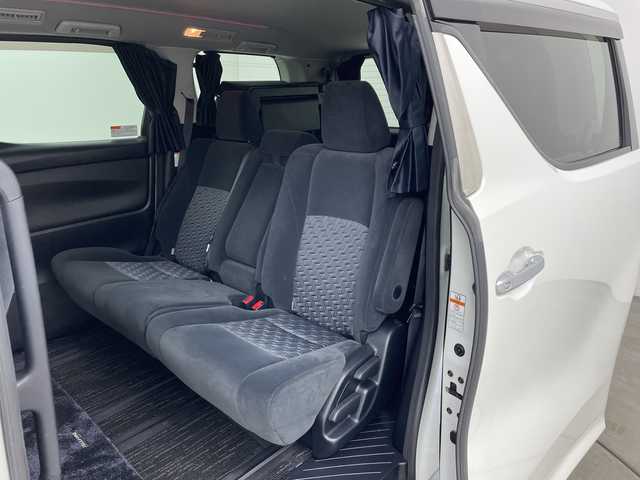 トヨタ ヴェルファイア Z 兵庫県 2015(平27)年 5万km ホワイトパールクリスタルシャイン ・社外10インチナビ（CN-F1X10BGD）/CD/DVD/Blu-ray/TV/SD/USB/HDMI/・バックカメラ/・純正11インチフリップダウンモニター（V11T-R62C）/・ビルトインETC/・両側パワースライドドア/・社外デジタルインナーミラー型前後ドライブレコーダー/・AC１００V電源/・社外車高調/・社外20インチアルミホイール/・nanoe/・LEDヘッドライト/・オートライト/・フォグランプ/・スマートキー/・プッシュスタート