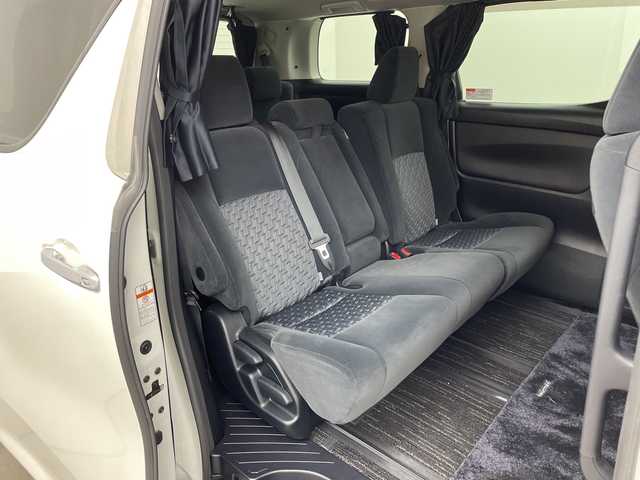 トヨタ ヴェルファイア Z 兵庫県 2015(平27)年 5万km ホワイトパールクリスタルシャイン ・社外10インチナビ（CN-F1X10BGD）/CD/DVD/Blu-ray/TV/SD/USB/HDMI/・バックカメラ/・純正11インチフリップダウンモニター（V11T-R62C）/・ビルトインETC/・両側パワースライドドア/・社外デジタルインナーミラー型前後ドライブレコーダー/・AC１００V電源/・社外車高調/・社外20インチアルミホイール/・nanoe/・LEDヘッドライト/・オートライト/・フォグランプ/・スマートキー/・プッシュスタート