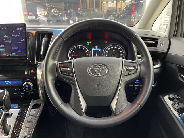 トヨタ ヴェルファイア Z 兵庫県 2015(平27)年 5万km ホワイトパールクリスタルシャイン ・社外10インチナビ（CN-F1X10BGD）/CD/DVD/Blu-ray/TV/SD/USB/HDMI/・バックカメラ/・純正11インチフリップダウンモニター（V11T-R62C）/・ビルトインETC/・両側パワースライドドア/・社外デジタルインナーミラー型前後ドライブレコーダー/・AC１００V電源/・社外車高調/・社外20インチアルミホイール/・nanoe/・LEDヘッドライト/・オートライト/・フォグランプ/・スマートキー/・プッシュスタート