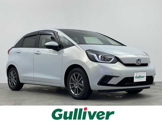 ホンダ フィット e:HEVホーム 鹿児島県 2021(令3)年 4.7万km プレミアムサンライトホワイトパール Ｈｏｎｄａ　ＳＥＮＳＩＮＧ　/●衝突軽減ブレーキ〈CMBS〉/●誤発進抑制機能/●後方誤発進抑制機能/●近距離衝突軽減ブレーキ/●歩行者事故低減ステアリング/●路外逸脱抑制機能/●渋滞追従機能付アダプティブ・クルーズ・コントロール〈ACC〉/●車線維持支援システム〈LKAS〉/●先行車発進お知らせ機能/●標識認識機能/●オートハイビーム/純正８型ナビ/（フルセグ/Bluetooth/CD/DVD）　/バックカメラ　/純正ＥＴＣ　/ブレーキホールド　/電子パーキング　/ステアリングリモコン　/電動格納ミラー　/ＩＳＯＦＩＸ　/レーダークルーズコントロール　/シートリフター/チップアップシート/ウインカーミラー/スペアキー1本