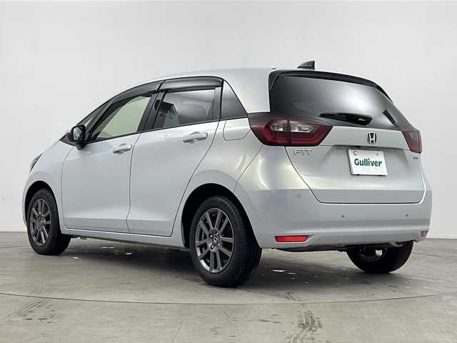 ホンダ フィット e:HEVホーム 鹿児島県 2021(令3)年 4.7万km プレミアムサンライトホワイトパール Ｈｏｎｄａ　ＳＥＮＳＩＮＧ　/●衝突軽減ブレーキ〈CMBS〉/●誤発進抑制機能/●後方誤発進抑制機能/●近距離衝突軽減ブレーキ/●歩行者事故低減ステアリング/●路外逸脱抑制機能/●渋滞追従機能付アダプティブ・クルーズ・コントロール〈ACC〉/●車線維持支援システム〈LKAS〉/●先行車発進お知らせ機能/●標識認識機能/●オートハイビーム/純正８型ナビ/（フルセグ/Bluetooth/CD/DVD）　/バックカメラ　/純正ＥＴＣ　/ブレーキホールド　/電子パーキング　/ステアリングリモコン　/電動格納ミラー　/ＩＳＯＦＩＸ　/レーダークルーズコントロール　/シートリフター/チップアップシート/ウインカーミラー/スペアキー1本