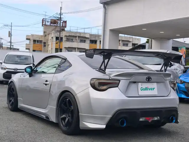 トヨタ ８６ GT 熊本県 2014(平26)年 4.9万km スターリングシルバー TRDエアロ/RAYS VOLKRACING17インチアルミホイール/HKSマフラー/HKS車高調/NARDIステアリング/VOLTEXリアウィング/ENDLESSブレーキキャリパー/社外テール/純正ナビ/【フルセグTV/CD/DVD/SD/BT】/バックカメラ/前後ドライブレコーダー/TVキャンセラー/ETC/LEDオートヘッドライト/スマートキー/プッシュスタート/取扱説明書(車両・ナビ)/純正ステアリング積込/純正テールランプ積込