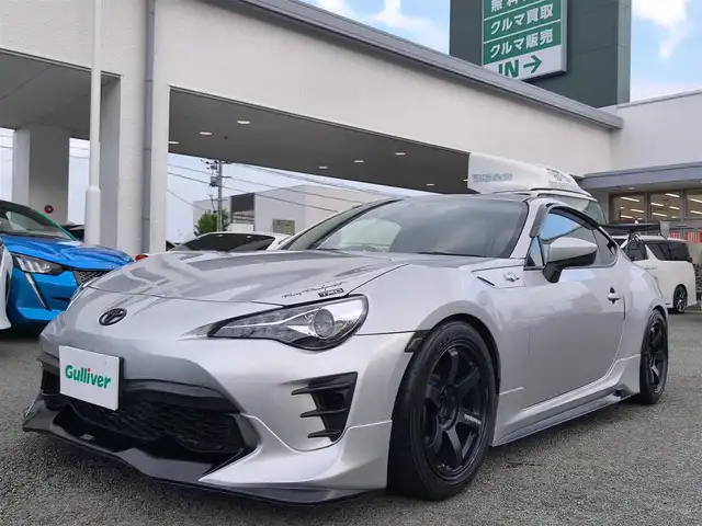 トヨタ ８６ GT 熊本県 2014(平26)年 4.9万km スターリングシルバー TRDエアロ/RAYS VOLKRACING17インチアルミホイール/HKSマフラー/HKS車高調/NARDIステアリング/VOLTEXリアウィング/ENDLESSブレーキキャリパー/社外テール/純正ナビ/【フルセグTV/CD/DVD/SD/BT】/バックカメラ/前後ドライブレコーダー/TVキャンセラー/ETC/LEDオートヘッドライト/スマートキー/プッシュスタート/取扱説明書(車両・ナビ)/純正ステアリング積込/純正テールランプ積込