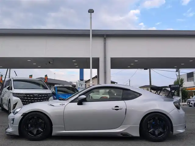 トヨタ ８６ GT 熊本県 2014(平26)年 4.9万km スターリングシルバー TRDエアロ/RAYS VOLKRACING17インチアルミホイール/HKSマフラー/HKS車高調/NARDIステアリング/VOLTEXリアウィング/ENDLESSブレーキキャリパー/社外テール/純正ナビ/【フルセグTV/CD/DVD/SD/BT】/バックカメラ/前後ドライブレコーダー/TVキャンセラー/ETC/LEDオートヘッドライト/スマートキー/プッシュスタート/取扱説明書(車両・ナビ)/純正ステアリング積込/純正テールランプ積込