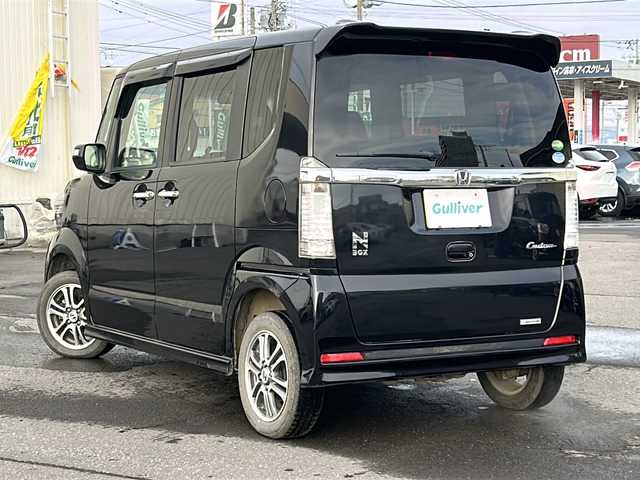 ホンダ Ｎ ＢＯＸ カスタム G Lパッケージ 道北・旭川 2013(平25)年 7.4万km プレミアムゴールドパープルパール /4WD//禁煙車//純正オーディオ//CD/AUX//エンジンスターター//片側電動ドア//横滑り防止//オートライト//HIDヘッドライト//フォグライト//プッシュスタート//スマートキー//純正フロアマット//モデューロAW夏タイヤ積込