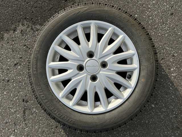 ホンダ Ｎ ＢＯＸ カスタム G Lパッケージ 道北・旭川 2013(平25)年 7.4万km プレミアムゴールドパープルパール /4WD//禁煙車//純正オーディオ//CD/AUX//エンジンスターター//片側電動ドア//横滑り防止//オートライト//HIDヘッドライト//フォグライト//プッシュスタート//スマートキー//純正フロアマット//モデューロAW夏タイヤ積込