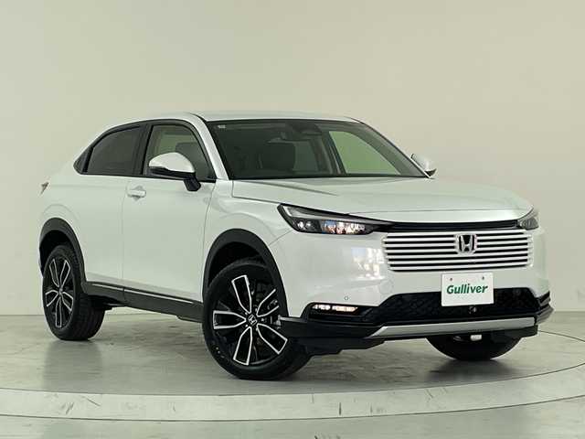 ホンダ ヴェゼル ハイブリッド e:HEV Z 大阪府 2025(令7)年 0.1千km プラチナホワイトパール HondaSENSING/・衝突軽減ブレーキ/・車線逸脱警報/・踏み間違い防止/・BSM/・レーダークルコン/Honda CONNECTディスプレーオーディオ/・ナビ機能/・Bluetooth/・フルセグTV/バックカメラ/ハーフレザーシート/前席シートヒーター/ステアリングヒーター/ETC2.0車載器/ワイヤレス充電器/パワーバックドア/パドルシフト