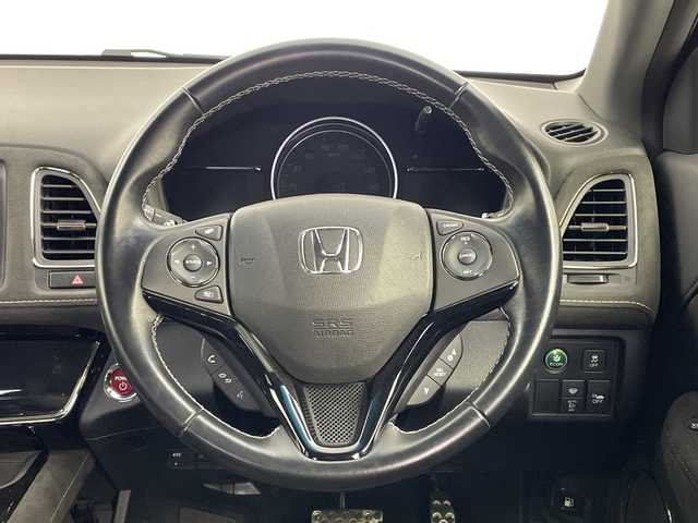 ホンダ ヴェゼル ハイブリッド RS ホンダセンシング 鹿児島県 2016(平28)年 2.2万km モルフォブルーP ホンダセンシング/・衝突軽減ブレーキ/・誤発進抑制機能/・クルーズコントロール/・車線維持支援システム/純正メモリナビ/CD/DVD/BT/フルセグTV/バックカメラ/LEDオートライト/フォグランプ/合皮ハーフレザーシート/シートヒーター/純正18インチアルミホイール/パドルシフト/アイドリングストップ/スマートキー/前後ドライブレコーダー/ビルトインETC