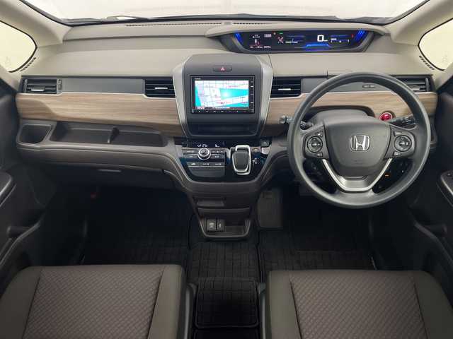 ホンダ フリード ハイブリット G ホンダセンシング 鹿児島県 2020(令2)年 6.6万km スーパープラチナグレーメタリック ホンダセンシング　/純正ナビ　/（Ｂｌｕｅｔｏｏｔｈ/CD)　/アダプティブクルーズコントロール　/両側パワースライドドア　/ドライブレコーダー　/バックカメラ　/ＥＴＣ　/ＬＥＤヘッドライト　/オートライト　/ステアリングリモコン/プッシュスタートボタン/スマートキー