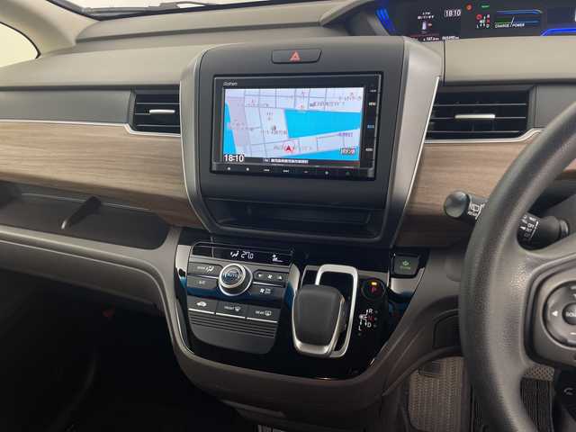 ホンダ フリード ハイブリット G ホンダセンシング 鹿児島県 2020(令2)年 6.6万km スーパープラチナグレーメタリック ホンダセンシング　/純正ナビ　/（Ｂｌｕｅｔｏｏｔｈ/CD)　/アダプティブクルーズコントロール　/両側パワースライドドア　/ドライブレコーダー　/バックカメラ　/ＥＴＣ　/ＬＥＤヘッドライト　/オートライト　/ステアリングリモコン/プッシュスタートボタン/スマートキー