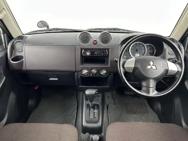 三菱 パジェロ ミニ VR 大分県 2010(平22)年 4万km アメジストブラック 社外オーディオ/４WD/キーレス/純正背面タイヤカバー/純正マッドフラップ/純正AW/ウィンカーミラー（メッキ）/メッキグリル/フロアマット/ドアバイザー