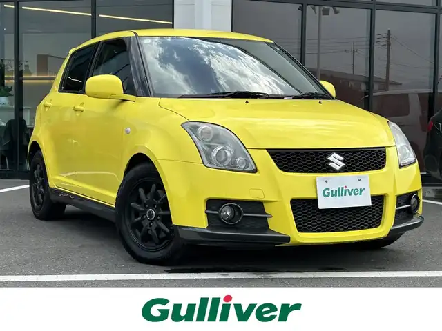 スズキ スイフト スポーツ 栃木県 2006(平18)年 11.1万km チャンピオンイエロー ナビ/スタットレス/社外AW15インチ/純正フロアマット/ETC/純正LEDヘッドライト/フォグランプ/カーテンエアバッグ/スペアキー1本