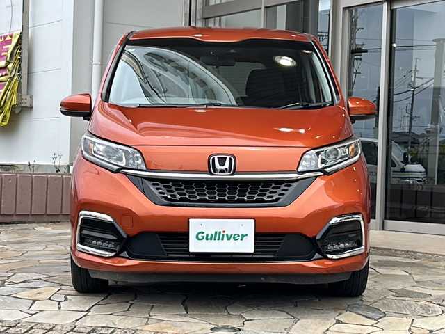 ホンダ フリード G ホンダセンシング 静岡県 2020(令2)年 2.7万km プレミアムクリスタルオレンジM 純正ナビ/・バックモニター/・Bluetooth/・フルセグTV/・CD/DVD/・USB/主要装備/・プッシュスタート/・ETC車載器/・両側パワースライドドア/・前席シートヒーター/・LEDヘッドライト/・純正AW/・オートライト/・純正フロアマット/・アイドリングストップ/・スペアキー/・後席サンシェード/ホンダセンシング/・衝突軽減ブレーキ/・車線維持支援システム/・アダプティブクルーズコントロール/・後方誤発進抑制機能/・誤発進抑制機能/・歩行者事故低減ステアリング/・路外逸脱抑制機能/・先行車発進お知らせ機能/・標識認識機能