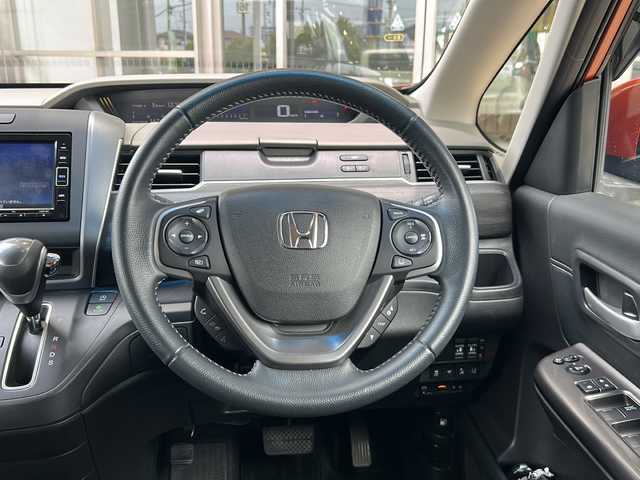 ホンダ フリード G ホンダセンシング 静岡県 2020(令2)年 2.7万km プレミアムクリスタルオレンジM 純正ナビ/・バックモニター/・Bluetooth/・フルセグTV/・CD/DVD/・USB/主要装備/・プッシュスタート/・ETC車載器/・両側パワースライドドア/・前席シートヒーター/・LEDヘッドライト/・純正AW/・オートライト/・純正フロアマット/・アイドリングストップ/・スペアキー/・後席サンシェード/ホンダセンシング/・衝突軽減ブレーキ/・車線維持支援システム/・アダプティブクルーズコントロール/・後方誤発進抑制機能/・誤発進抑制機能/・歩行者事故低減ステアリング/・路外逸脱抑制機能/・先行車発進お知らせ機能/・標識認識機能