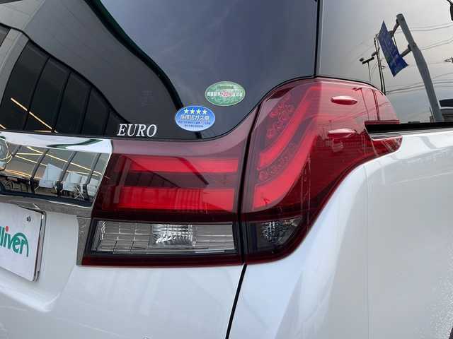 トヨタ アルファードハイブリット G 新潟県 2016(平28)年 11万km ホワイトパールクリスタルシャイン メーカーオプションナビ/フルセグTV/BT/CD/DVD/AUX/バックカメラ/JBL/両側パワースライドドア/フリップダウンモニター/レーダークルーズコントロール/ETC/4WD/オットマン/D＋N席　パワーシート/ドライブレコーダー前後/ナノイーエアコン/スペアキー1本/スマートキー/社外19インチアルミホイール/ウォークスルー