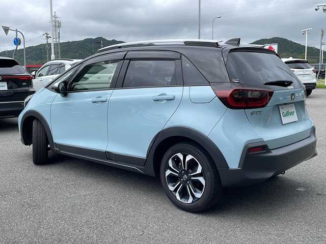 ホンダ フィット e:HEVクロスター 兵庫県 2020(令2)年 8.7万km サーフブルー/ブラック 純正ナビ/・BT/・CD/DVD/クルーズコントロール（追従あり）/ホンダセンシング機能付き/純正アルミホイール/純正フロアマット/カーテンエアバック/置くだけ充電/ビルトインETC/ルーフレール