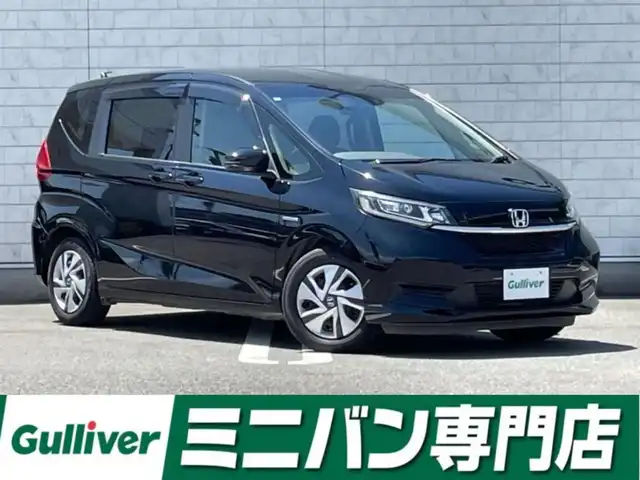 ホンダ フリード ハイブリット G ホンダセンシング 福岡県 2020(令2)年 0.7万km クリスタルブラックパール 純正7型SDナビ(CD/DVD/BT)バックモニタホンダセンシング両側パワースライドドアレーダークルーズコントロールETCUSB純正フロアマット純正LEDライトプッシュスタートスマートキー