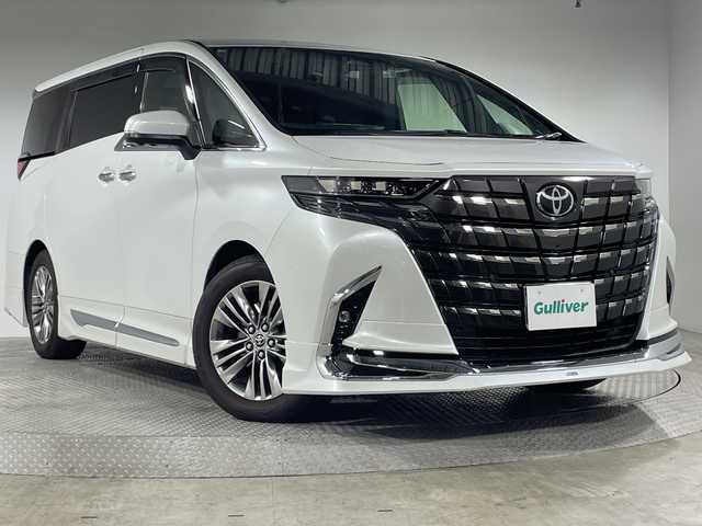 トヨタ アルファードハイブリット Z 神奈川県 2023(令5)年 3万km プラチナホワイトパールマイカ トヨタセーフティセンス/・プリクラッシュセーフティ/・レーダークルーズコントロール/・レーントレーシングアシスト/・ロードサインアシスト/・アダプティブハイビームシステム/オートマチックハイビーム/純正メーカーオプションディスプレイオーディオ/・ナビTVキット付き/BT/MiraCast/タイプC/パノラミックビューモニター/モデリスタフルエアロ/モデリスタマフラー/電子インナーミラー/Qi充電/MTモード/AC100V/両側電動スライドドア/パワーバックドア/革巻きステアリング/ステアリングスイッチ/Autoライト/ビルトインETC2.0/電動サイドブレーキ/オートホールド/SOSコール/nanoeX/レザーシート/シートヒーター(D/N/2列目)/ベンチレーション(D/N/2列目)/パワーシート(D/N/2列目)/メモリシート(D)/スマートキー/プッシュスタートボタン/BSM/電動格納ミラー/ウィンカーミラー/シーケンシャルウィンカー/LEDヘッドライト/フォグランプ/純正アルミホイール/純正ドアバイザー/純正フロアマット