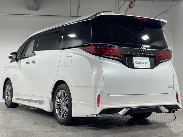 トヨタ アルファードハイブリット Z 神奈川県 2023(令5)年 3万km プラチナホワイトパールマイカ トヨタセーフティセンス/・プリクラッシュセーフティ/・レーダークルーズコントロール/・レーントレーシングアシスト/・ロードサインアシスト/・アダプティブハイビームシステム/オートマチックハイビーム/純正メーカーオプションディスプレイオーディオ/・ナビTVキット付き/BT/MiraCast/タイプC/パノラミックビューモニター/モデリスタフルエアロ/モデリスタマフラー/電子インナーミラー/Qi充電/MTモード/AC100V/両側電動スライドドア/パワーバックドア/革巻きステアリング/ステアリングスイッチ/Autoライト/ビルトインETC2.0/電動サイドブレーキ/オートホールド/SOSコール/nanoeX/レザーシート/シートヒーター(D/N/2列目)/ベンチレーション(D/N/2列目)/パワーシート(D/N/2列目)/メモリシート(D)/スマートキー/プッシュスタートボタン/BSM/電動格納ミラー/ウィンカーミラー/シーケンシャルウィンカー/LEDヘッドライト/フォグランプ/純正アルミホイール/純正ドアバイザー/純正フロアマット