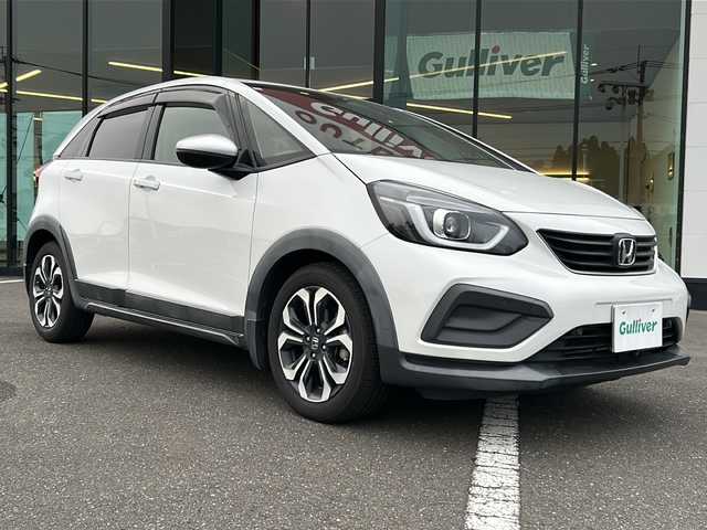 ホンダ フィット クロスター 鹿児島県 2020(令2)年 7.6万km プラチナホワイトパール 純正ナビ／Bluetooth／CD／DVD/ワンセグテレビ/クルーズコントロール/パーキングアシスト／バックカメラ/パワーウィンドウ/パワーステアリング/USB入力端子/ETC/オートライト/アイドリングストップ/プッシュスタートボタン/純正LEDヘッドライト
