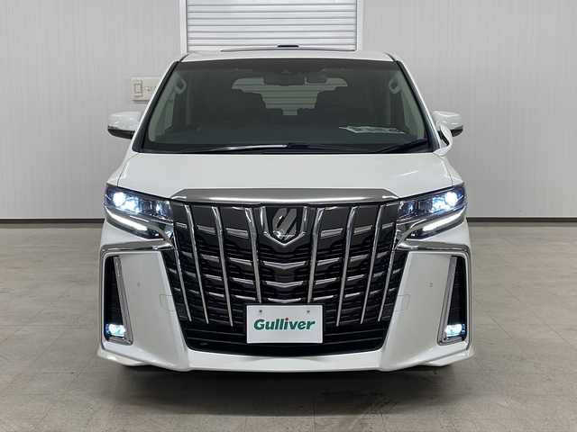 トヨタ アルファード S Cパッケージ 熊本県 2020(令2)年 8.9万km ホワイトパールクリスタルシャイン 純正メモリナビ（ＣＤ/ＤＶＤ/ＢＴ/ラジオ/フルセグ）/サンルーフ/フリップダウンモニター/バックカメラ/ドライブレコーダー/ＥＴＣ/両側パワースライドドア/Ｄ・Ｎ席パワーシート/Ｄ席メモリーシート/Ｄ・Ｎ席シートヒーター・エアシート/パワーバックドア/レーダークルーズコントロール/レーンキープ/衝突軽減システム/横滑り防止装置/前後コーナーセンサー/ステアリングヒーター/ステアリングスイッチ/オートハイビーム/オートライト/フォグランプ/電動パーキングブレーキ（オートホールド付き）/純正フロアマット/ドアバイザー/純正18インチＡＷ/プッシュスタート/スマートキー